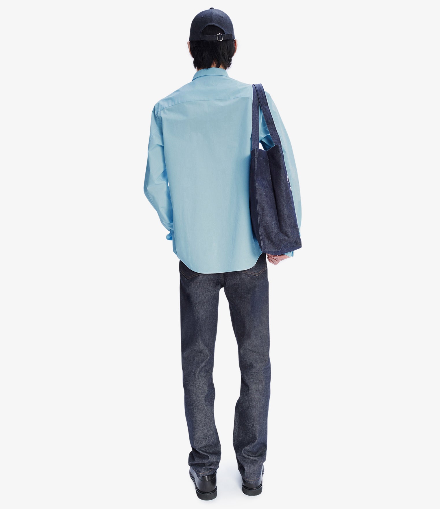 Side profile of the rigid denim leg.