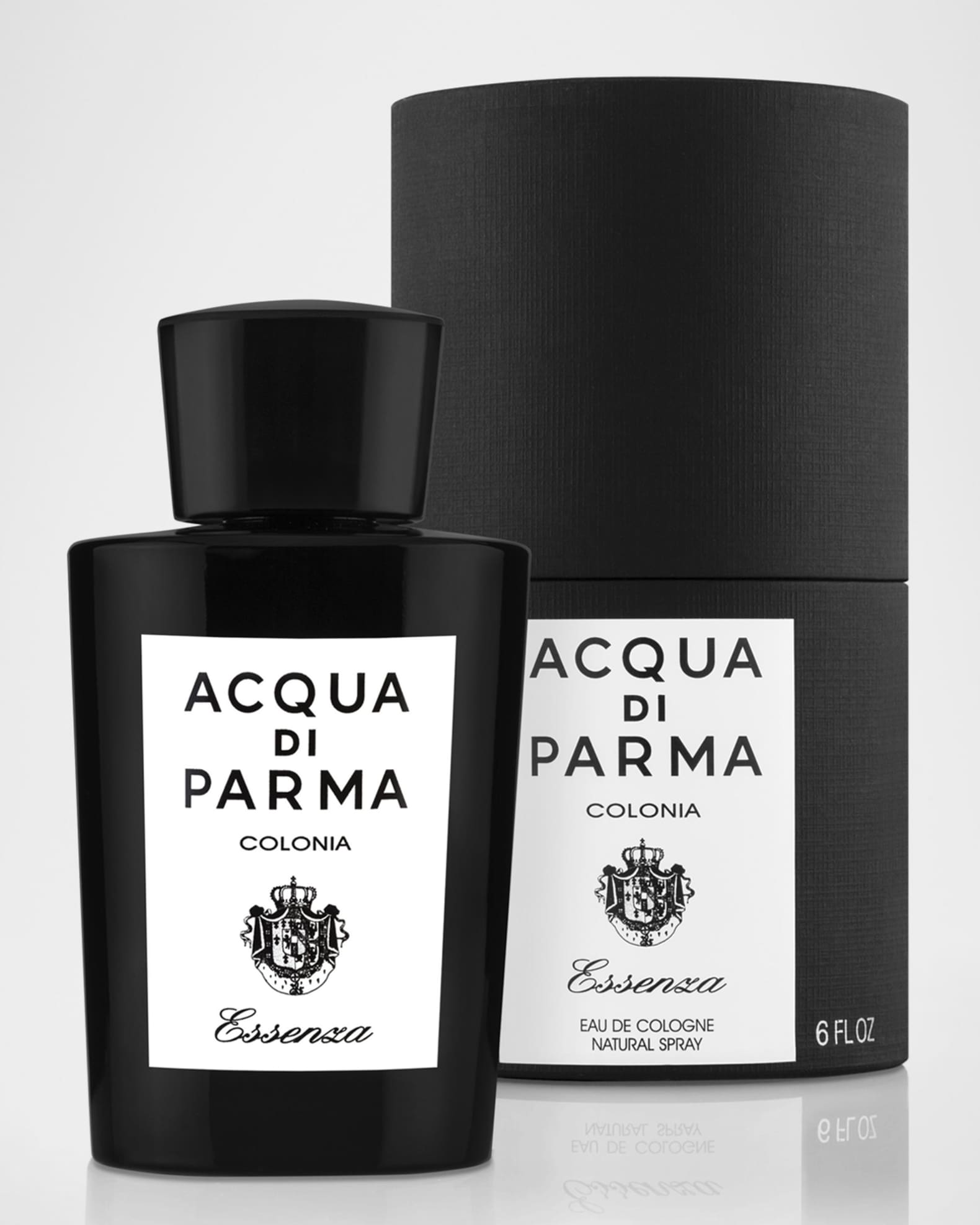 Bottle and black cylindrical box