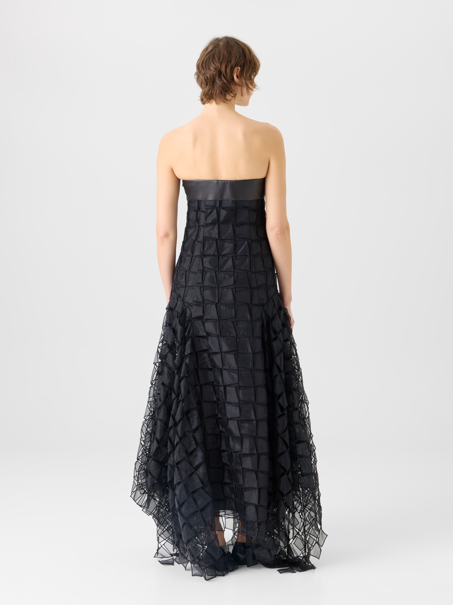 Runway-clean black silhouette