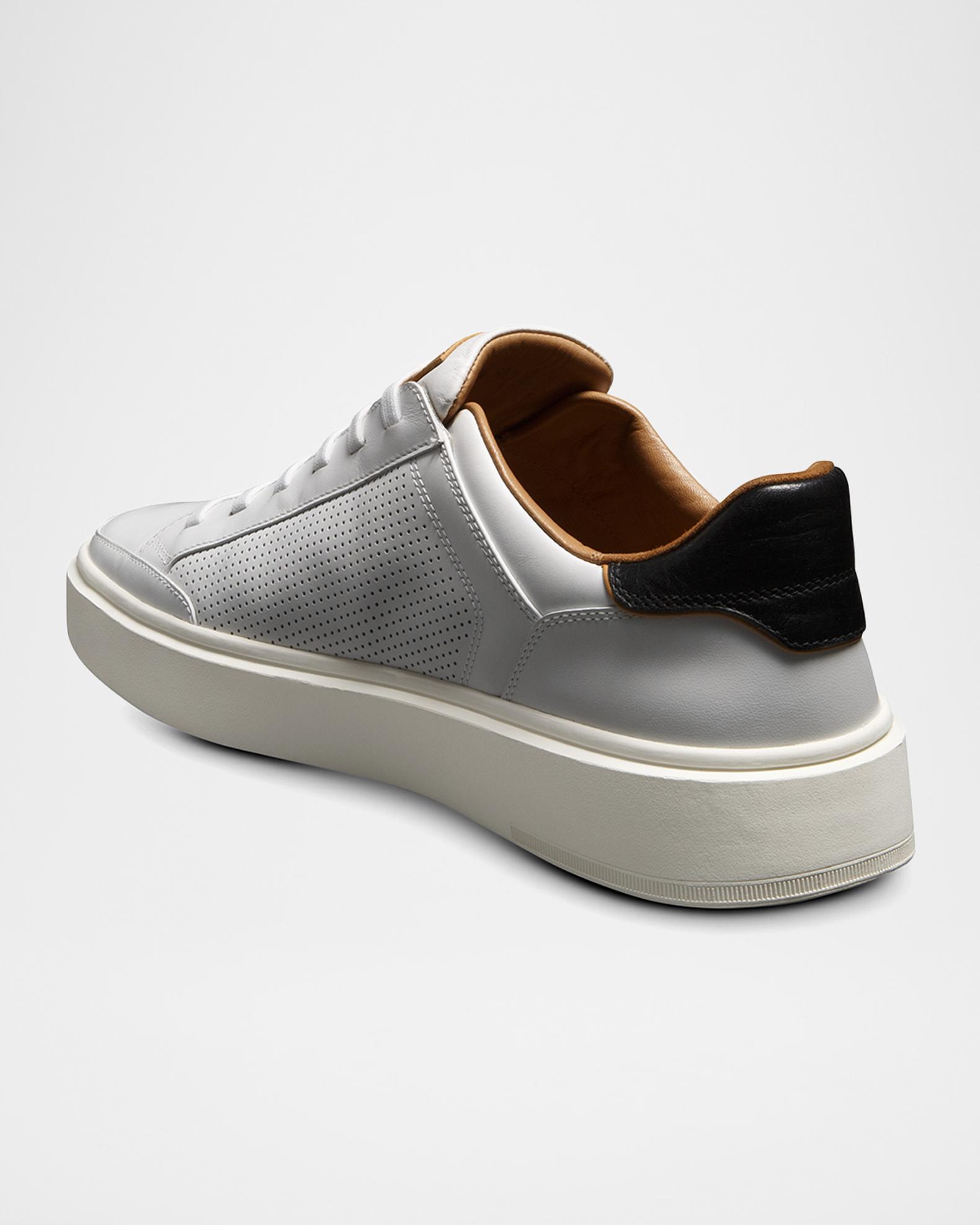 White sneaker rear-quarter angle