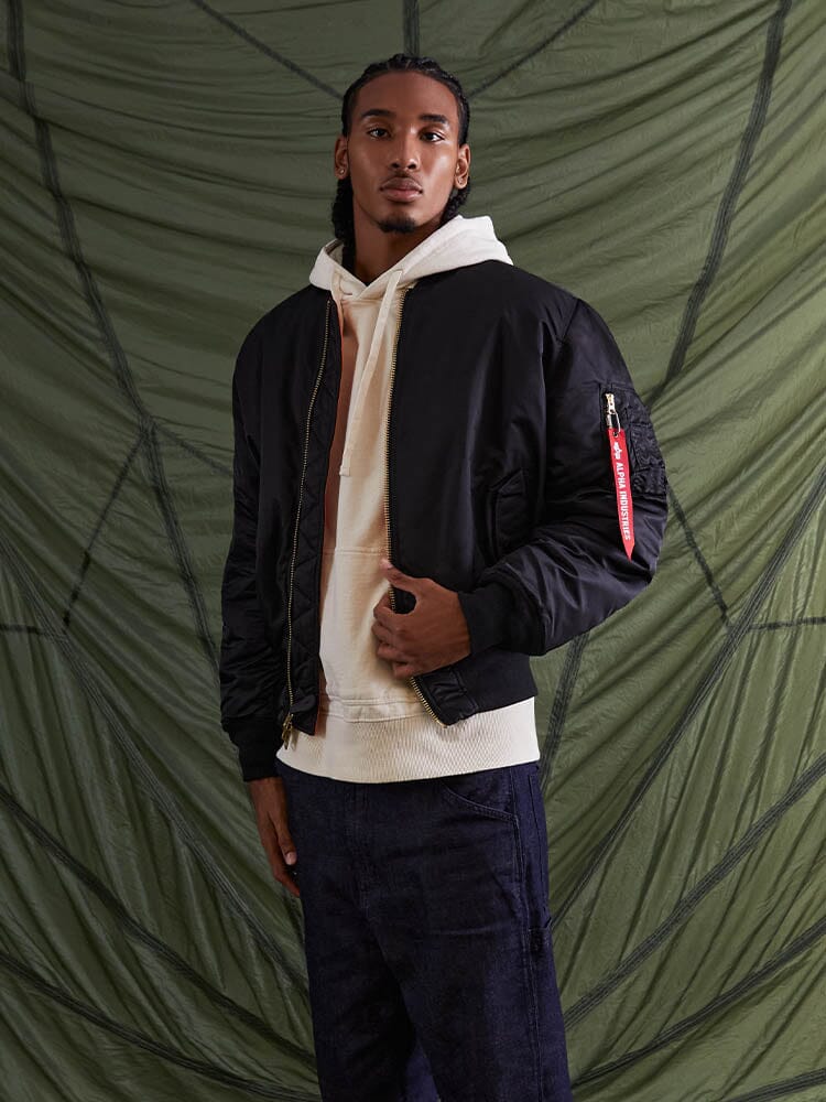 On-body view with the bomber zipped