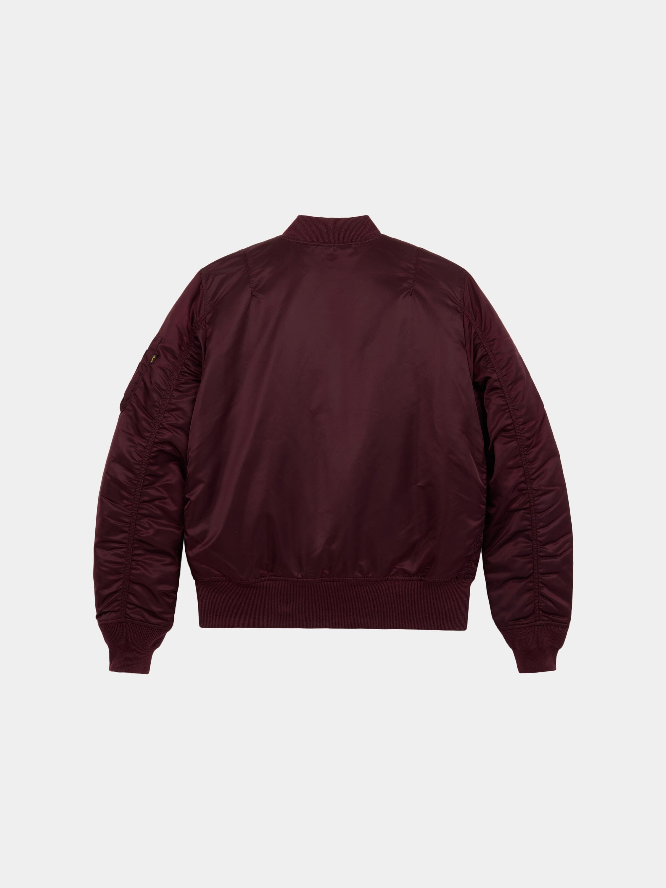 Back view of the slim bomber cut