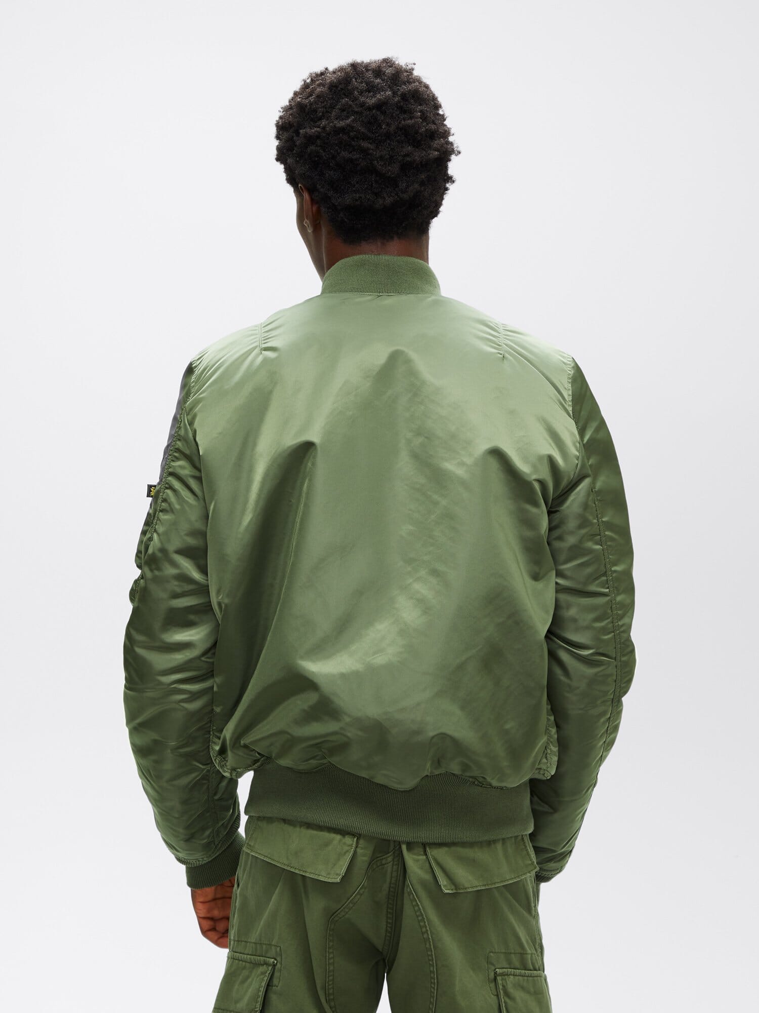 Sleeve pocket and red ribbon detail