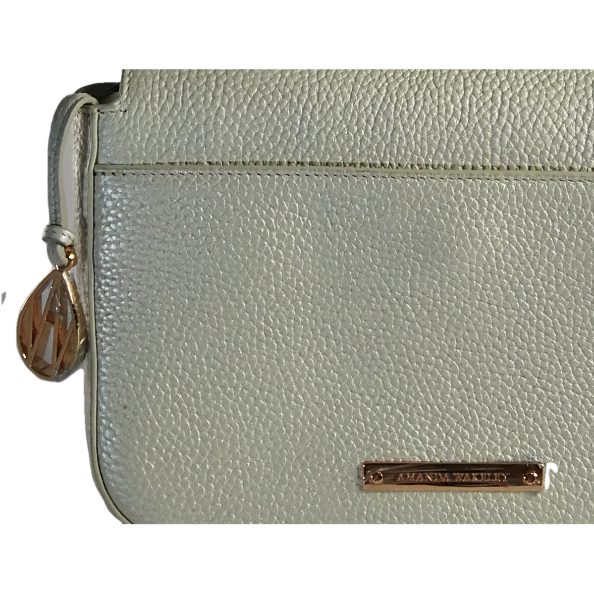 Pebbled leather back and branding plate