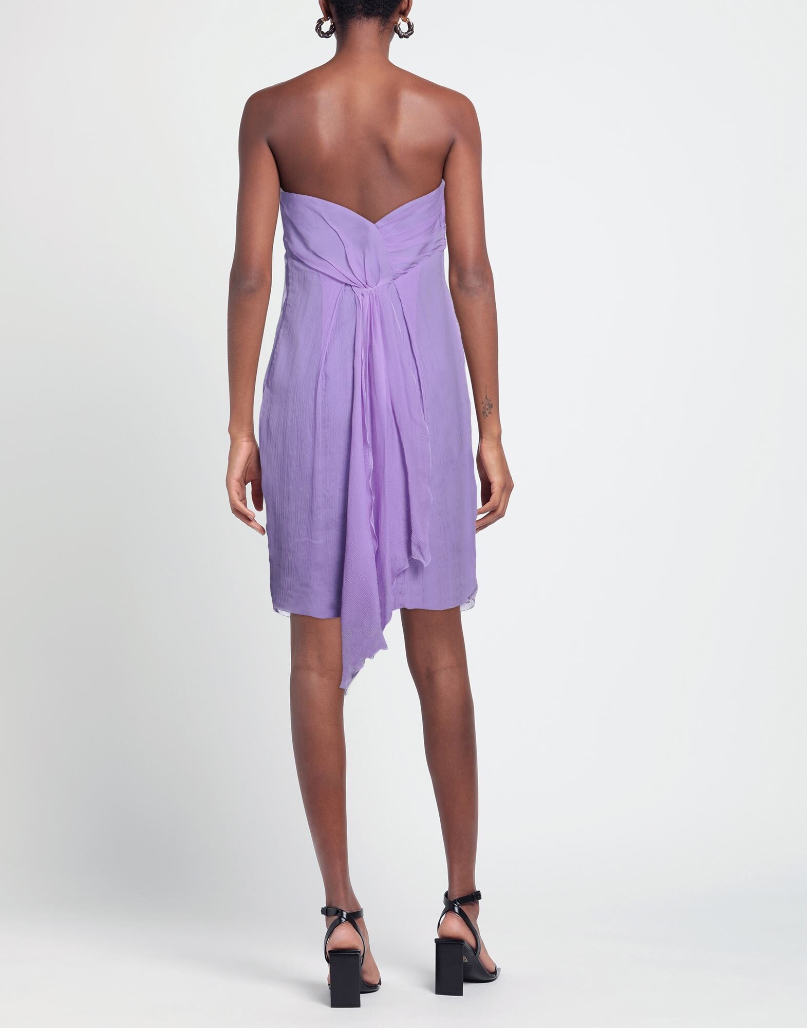Back view showing closure and silhouette