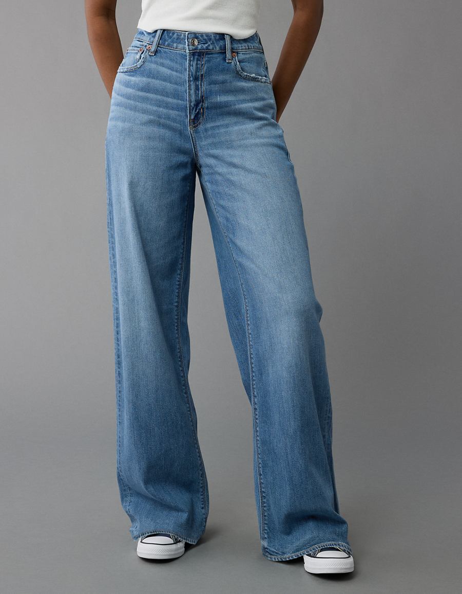 Styled front view showing the pooled wide leg