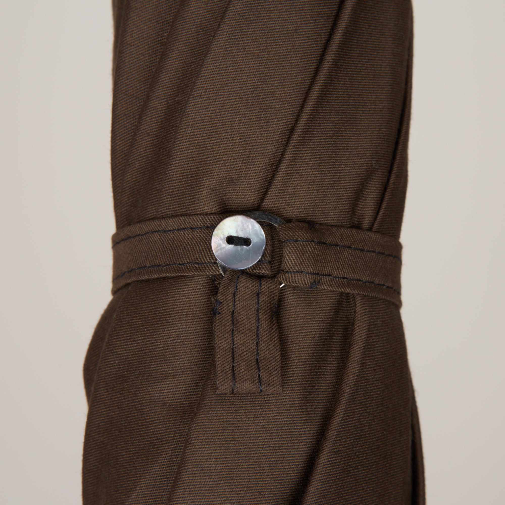 Loop-and-button fastening