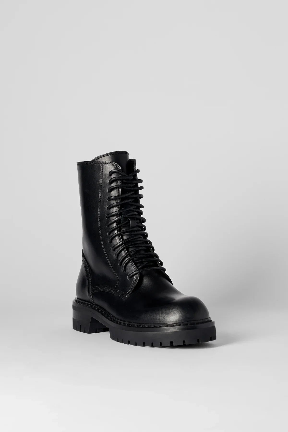 Three-quarter profile on cleated sole
