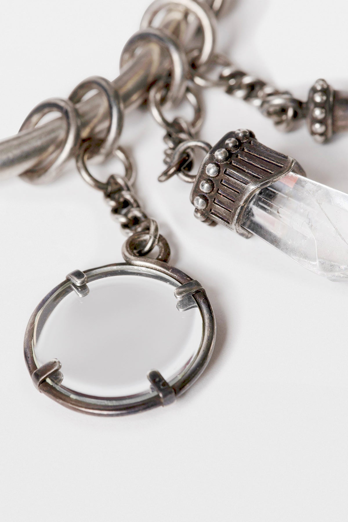 Close crop of ring and charms
