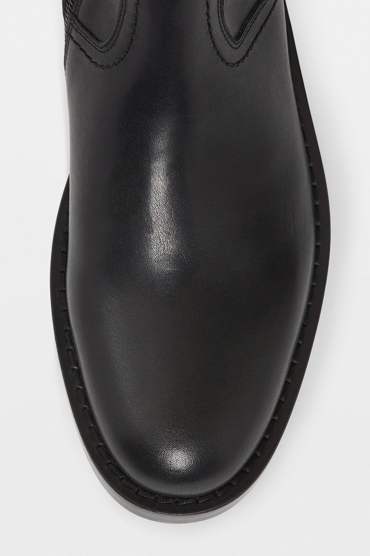 Close crop of lacing and side zip