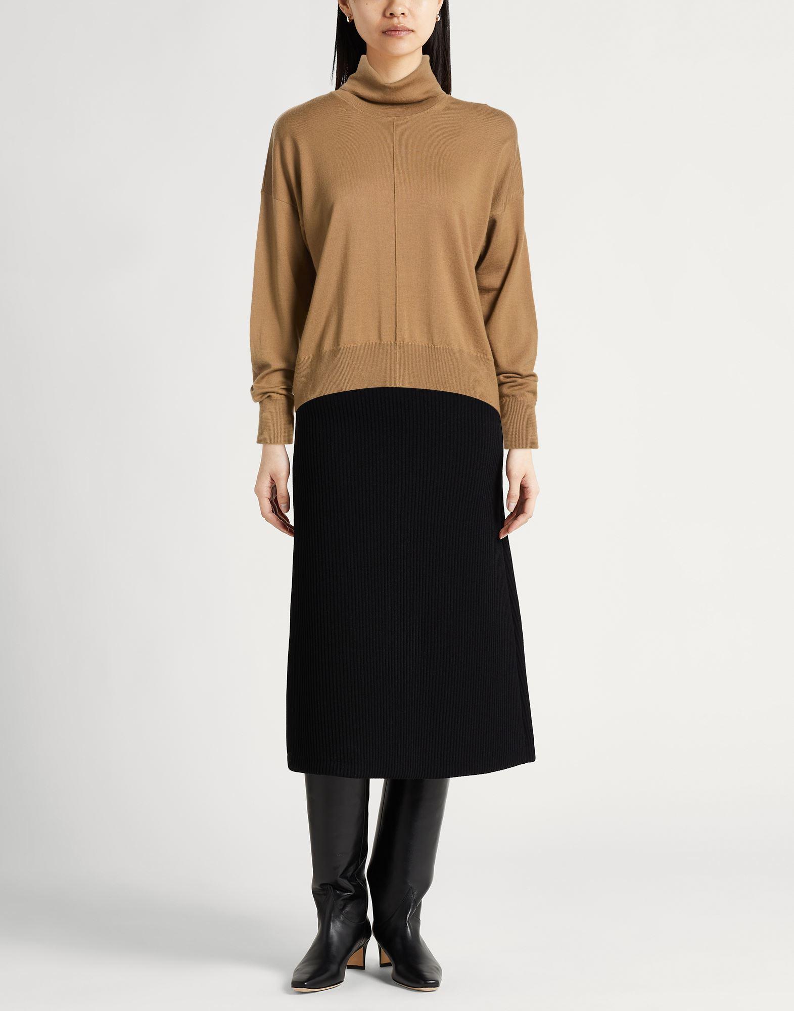 camel turtleneck back view