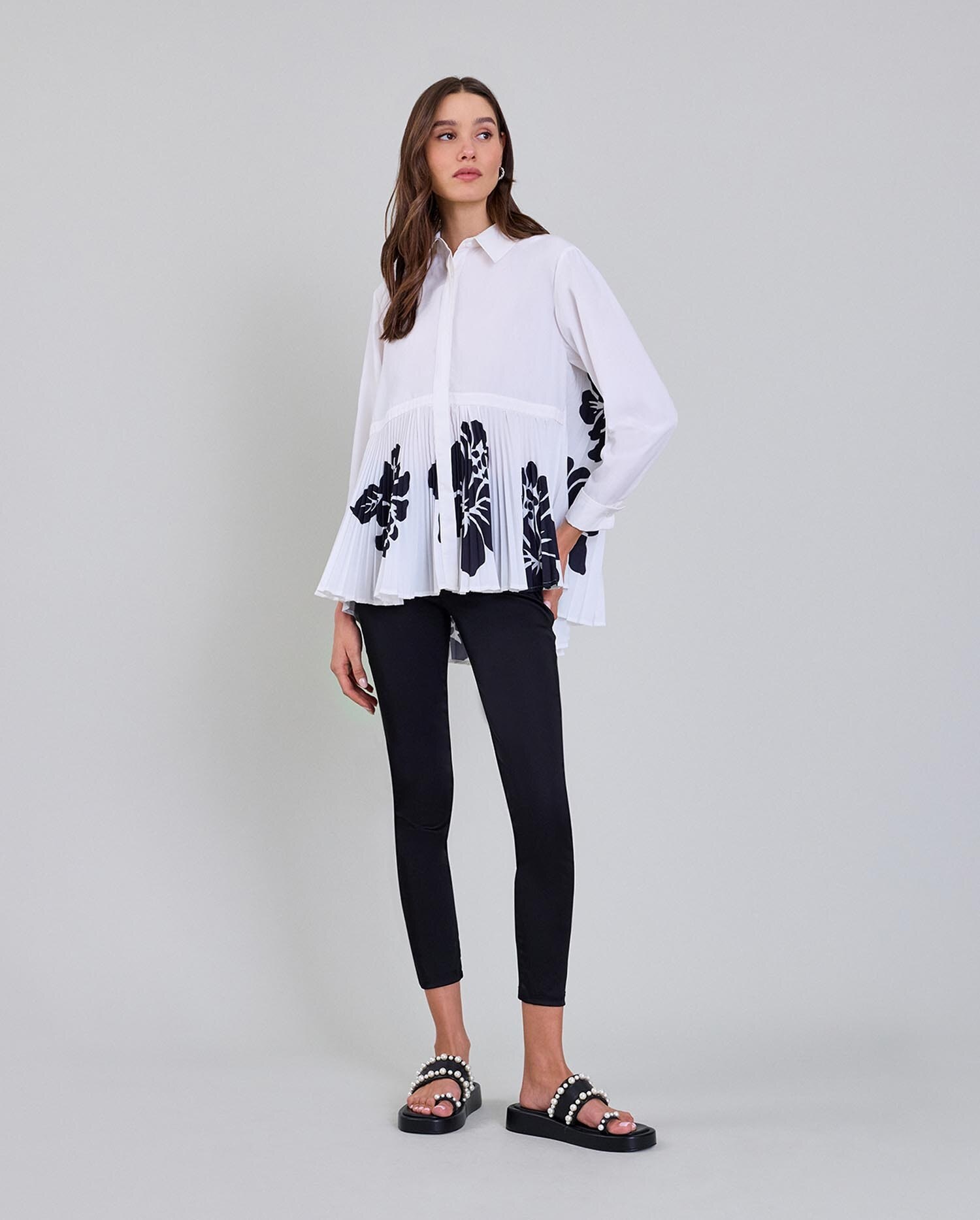 front view in black slim trousers