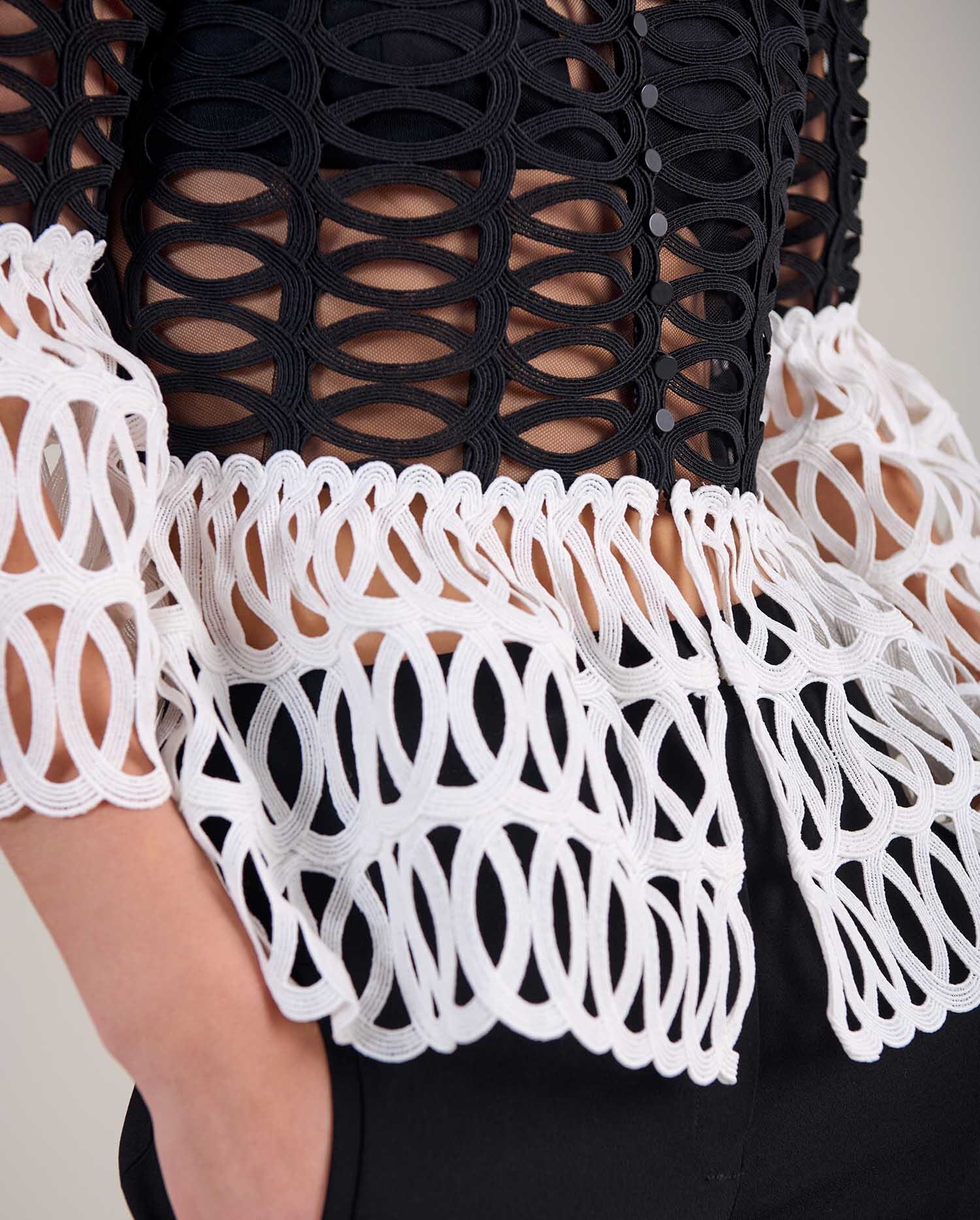 openwork detail and scalloped cuff