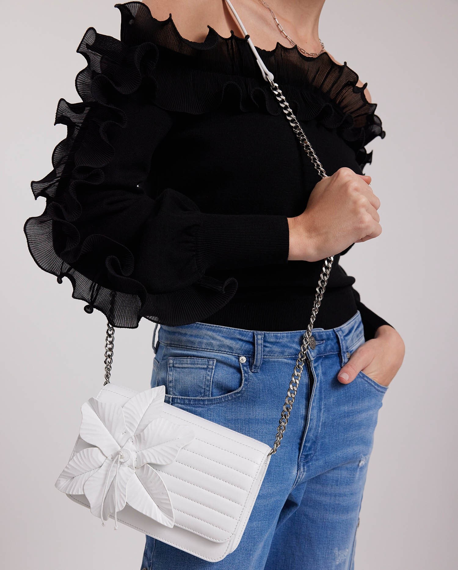 white Nicki shoulder carry