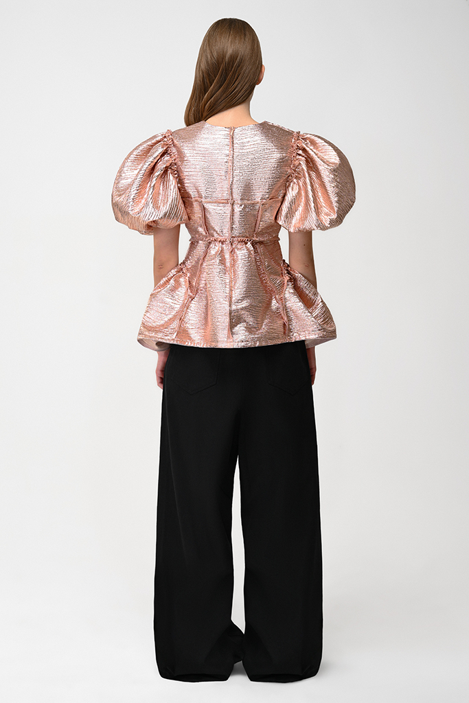 Three-quarter styling with black trousers