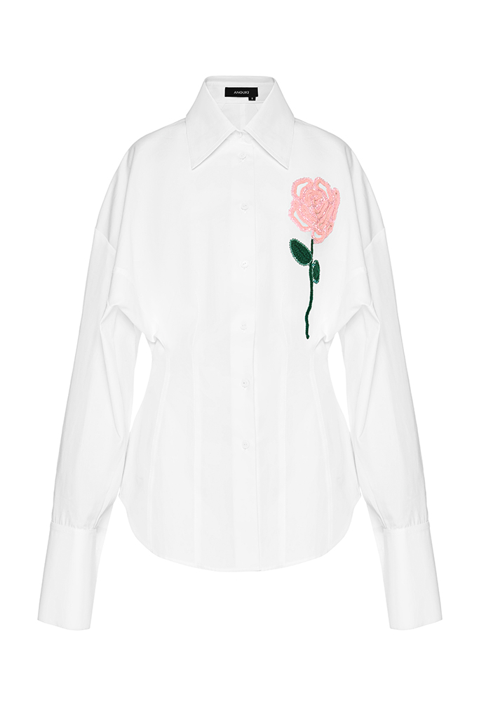 Close view of the rose appliqué