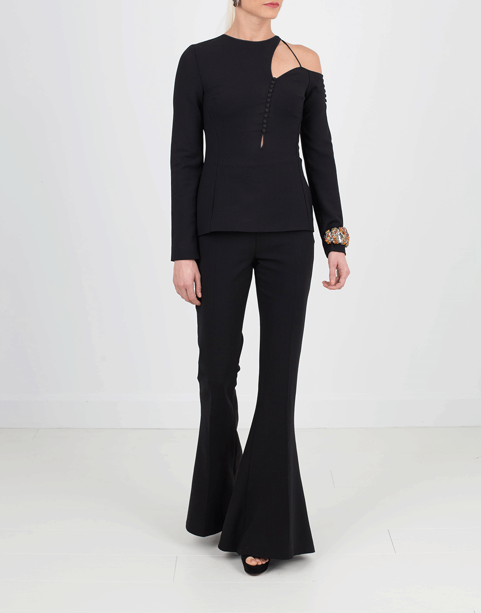 On-body front view with slim top and flared trouser