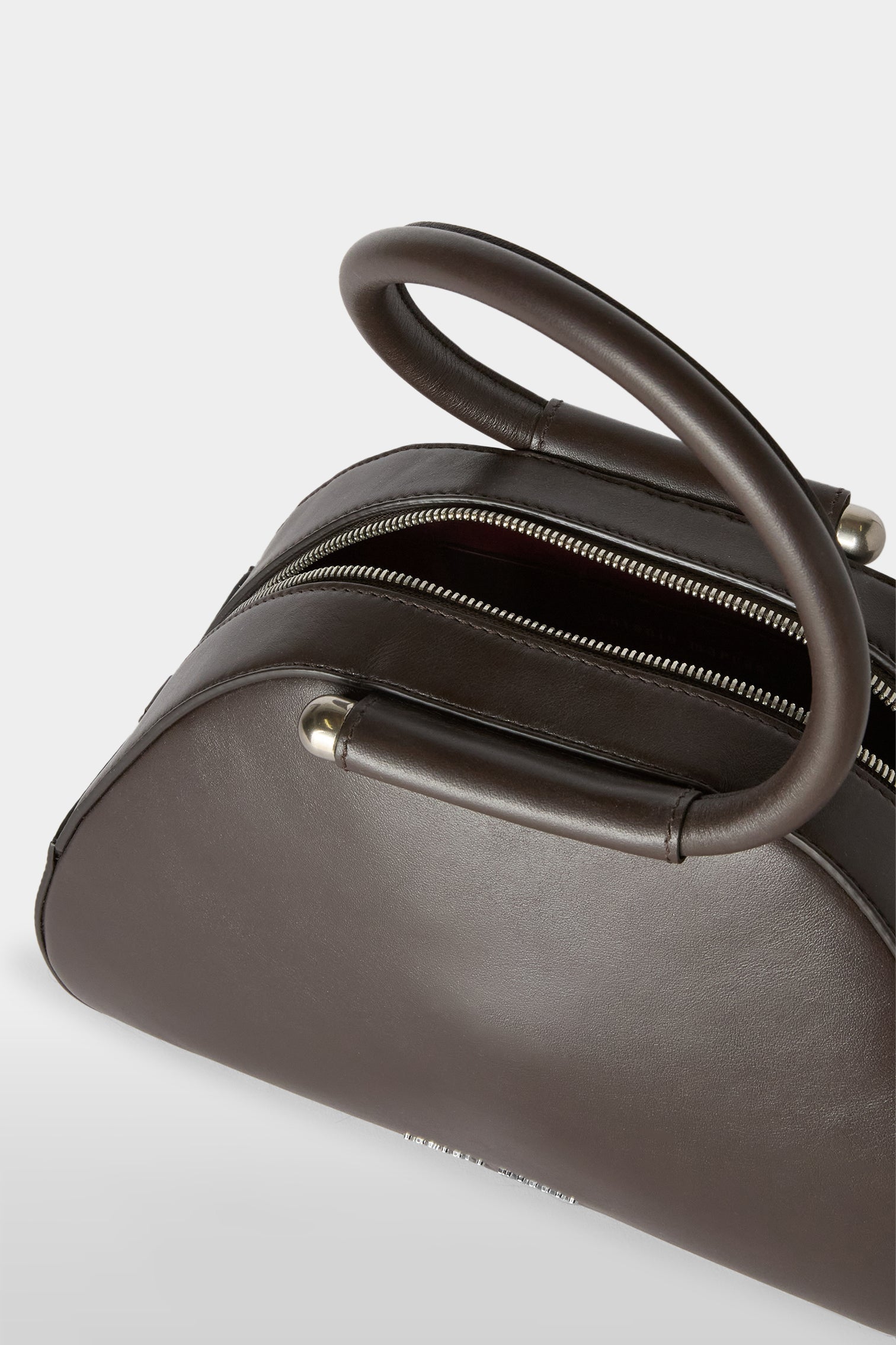 brown top-zip detail