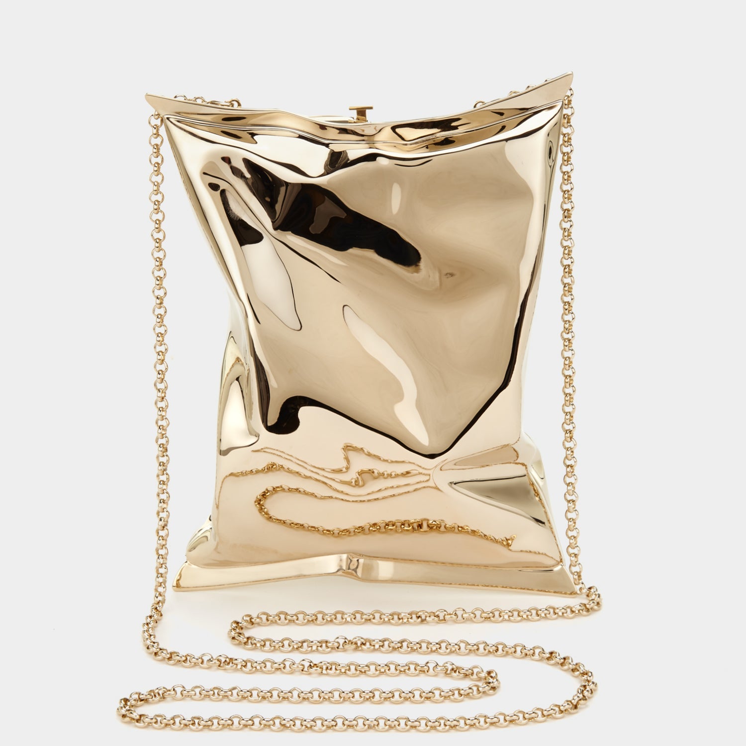 Detachable cross-body chain styled with the clutch