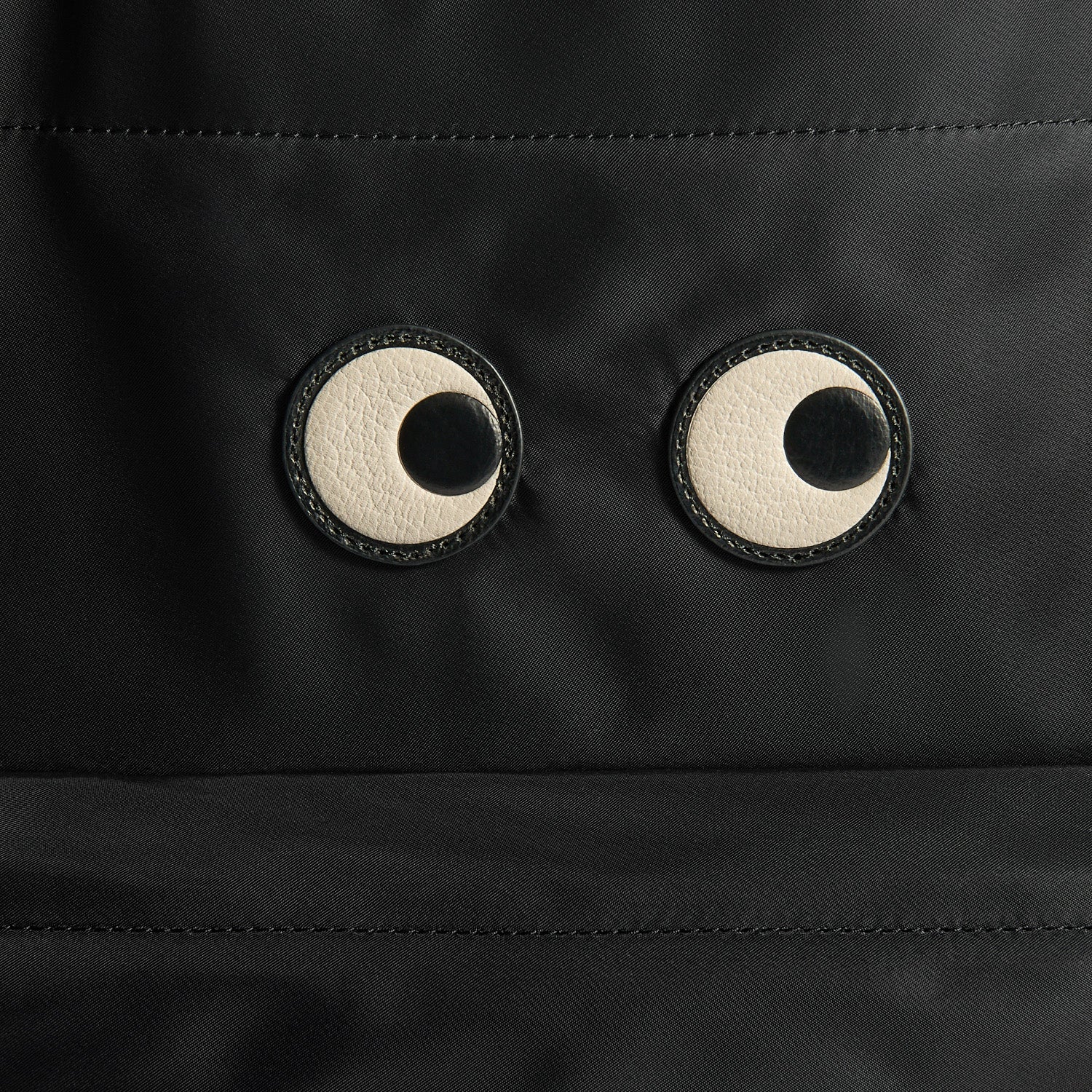 Close-up of the appliquéd Eyes motif