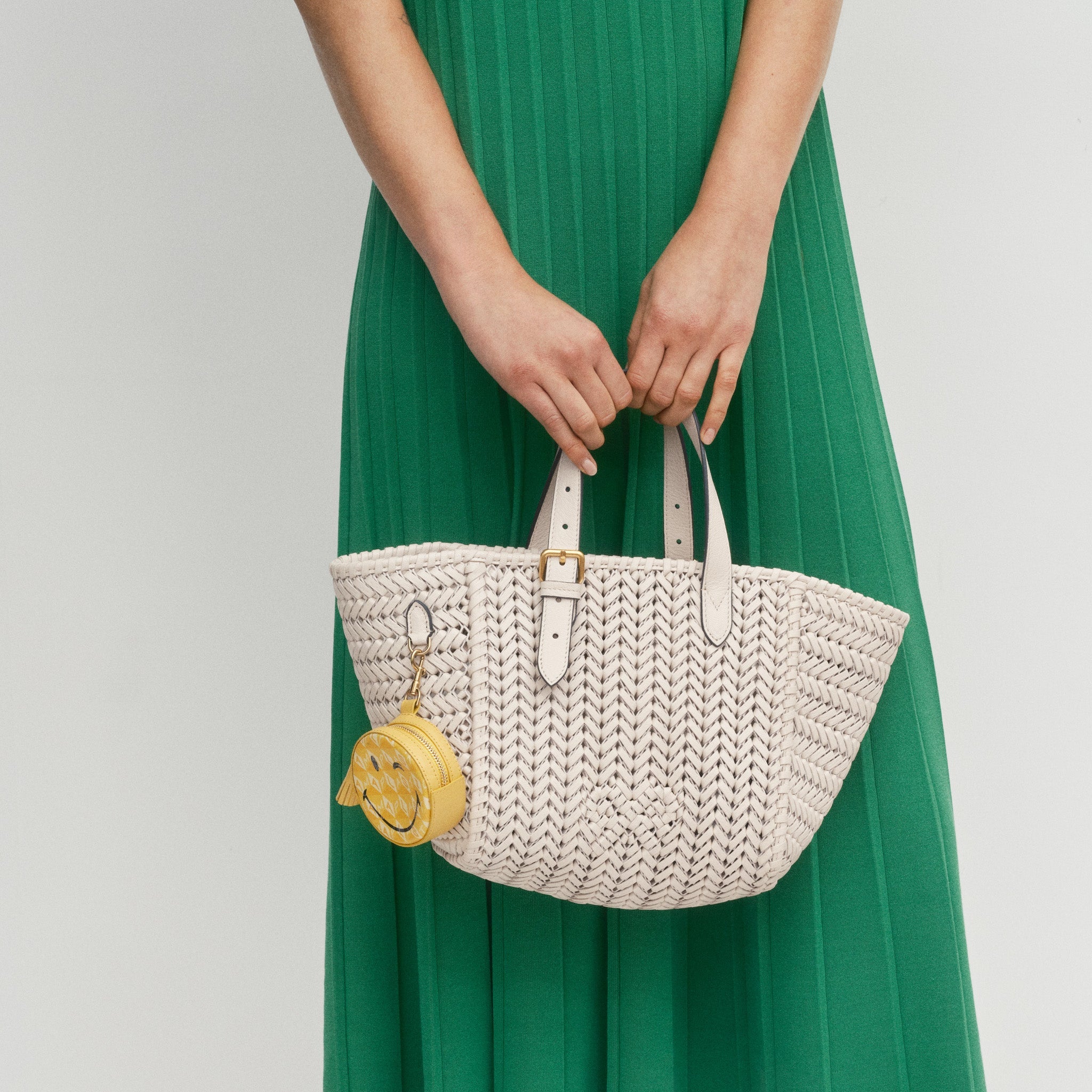 Close-up of the woven leather and bow detail