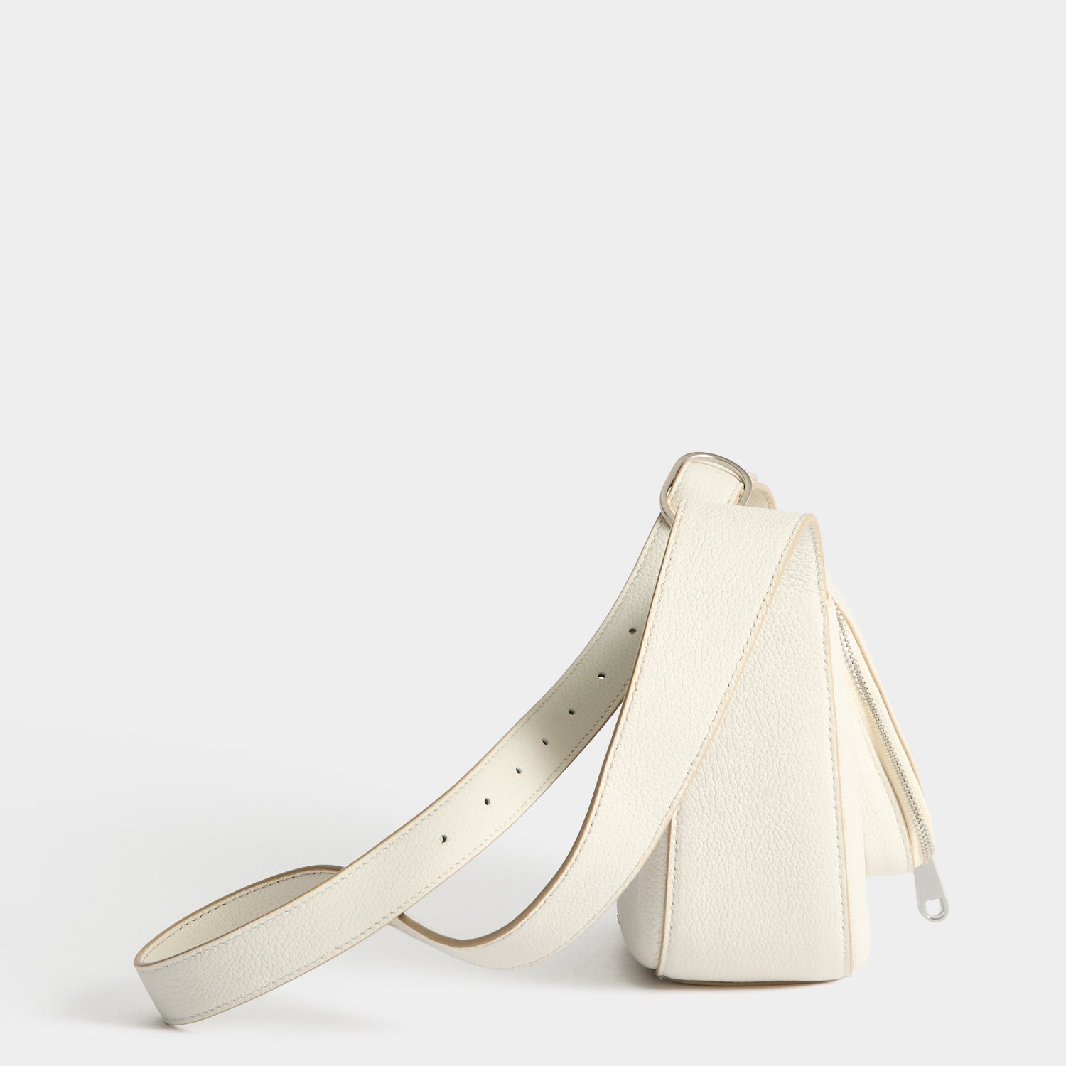 Side detail showing the compact cross-body depth