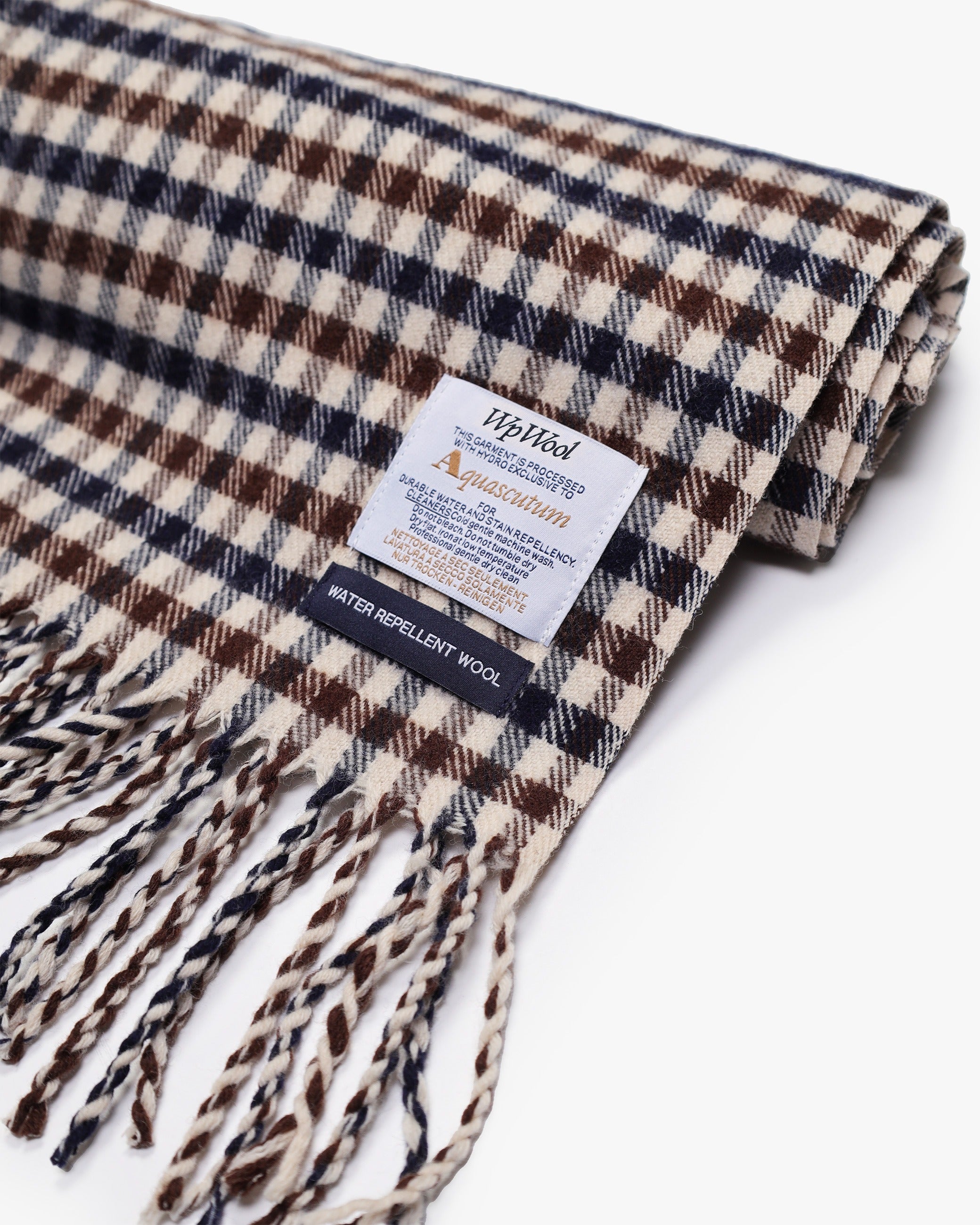 Fringe and woven-label detail