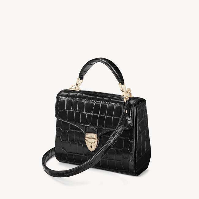Three-quarter packshot with detachable strap