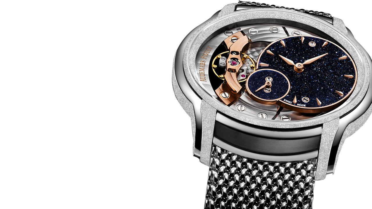 Angled view highlighting the sculptural case and open dial