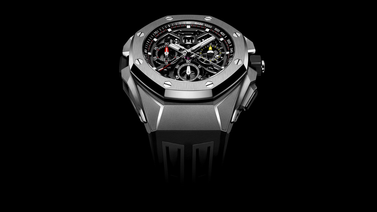 Front studio view with openworked dial and black rubber strap