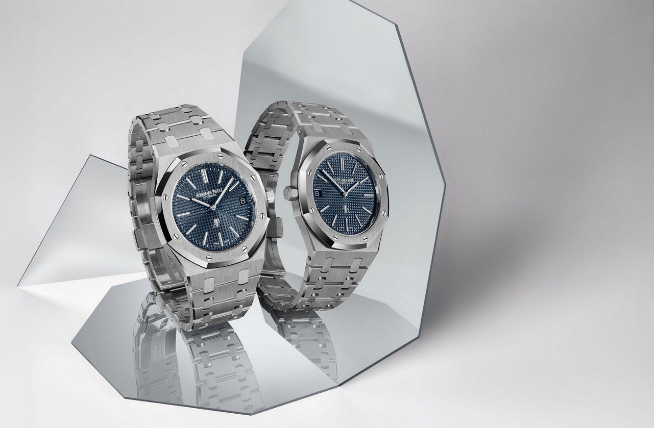Paired Jumbo watches in a bright studio setting