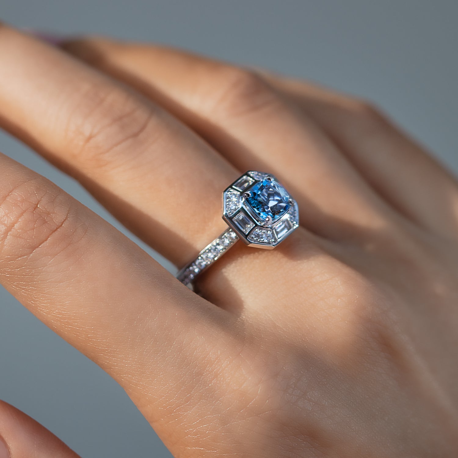 Deco Darling ring worn with a geometric halo