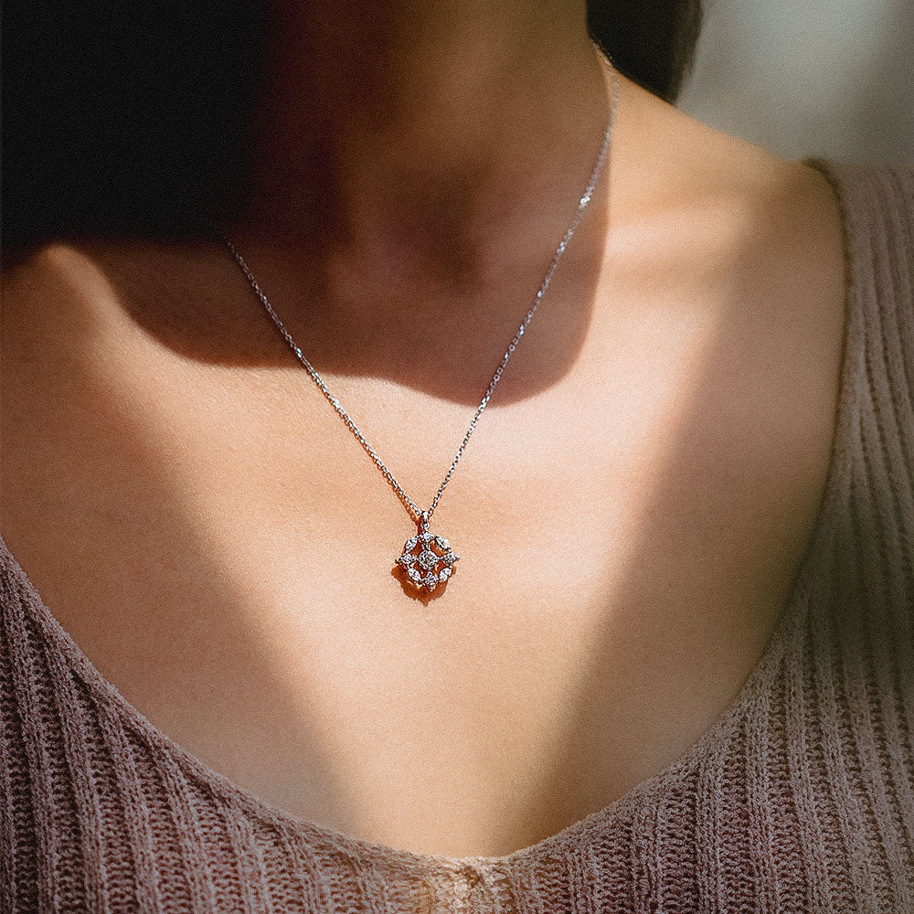 Necklace worn with the old-mine diamond at centre