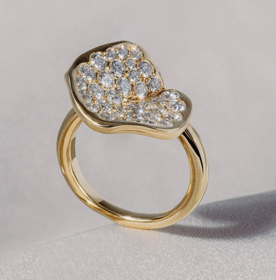 Grand Lotus ring in angled light