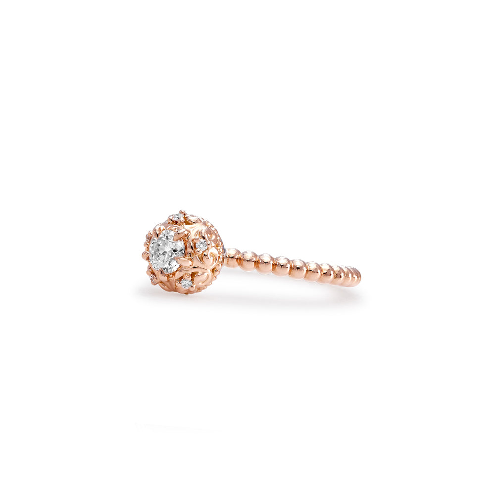 Dainty Diamond Ring worn with the motif visible