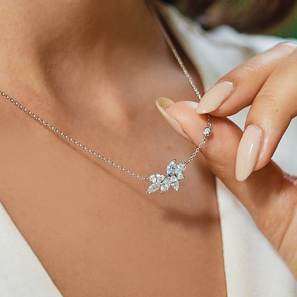 Diamond Bloom necklace worn at the collarbone