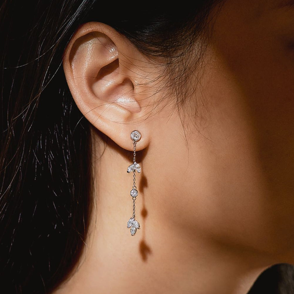 Marquise motif earring worn as a drop