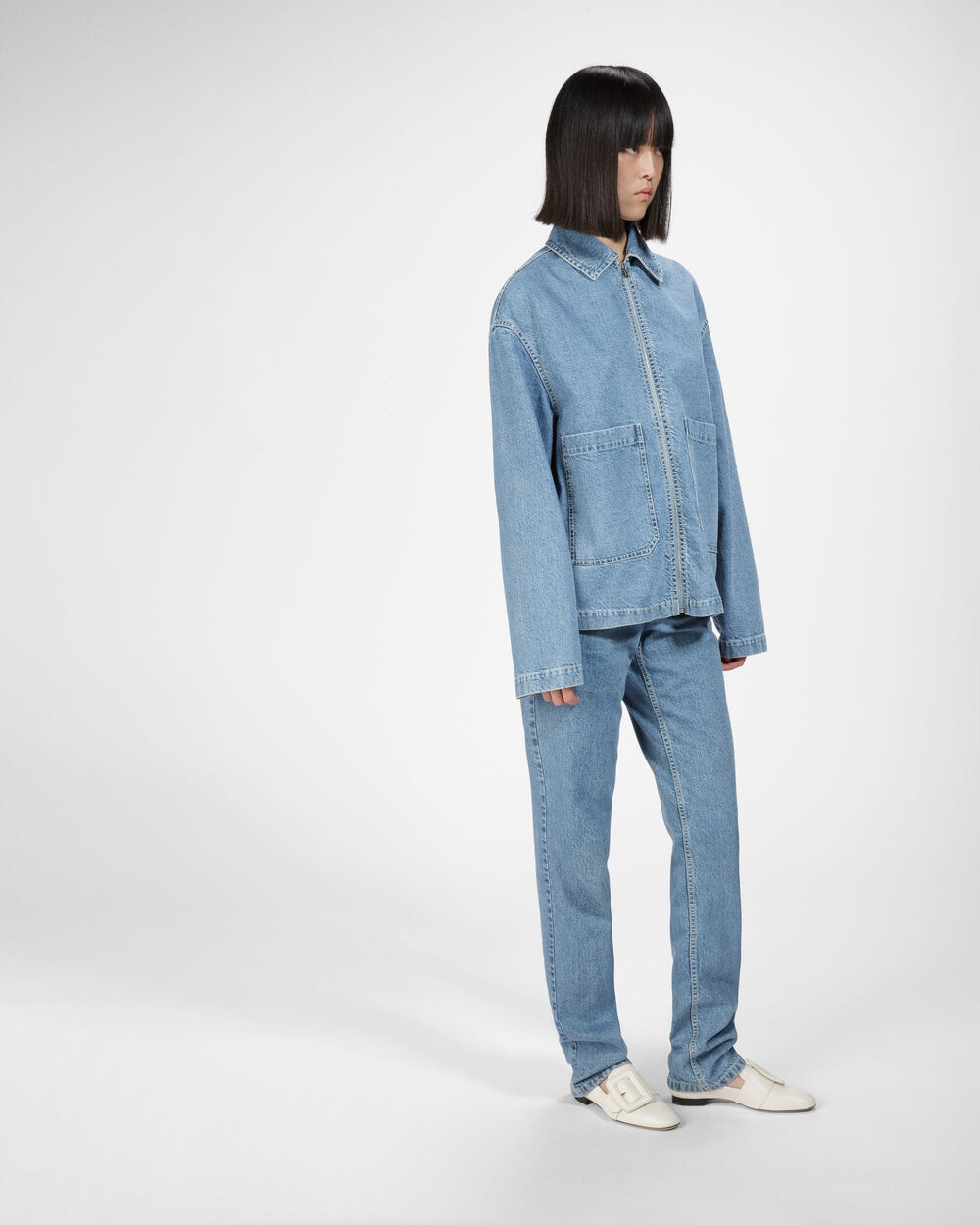 On-foot styling with the square buckle visible