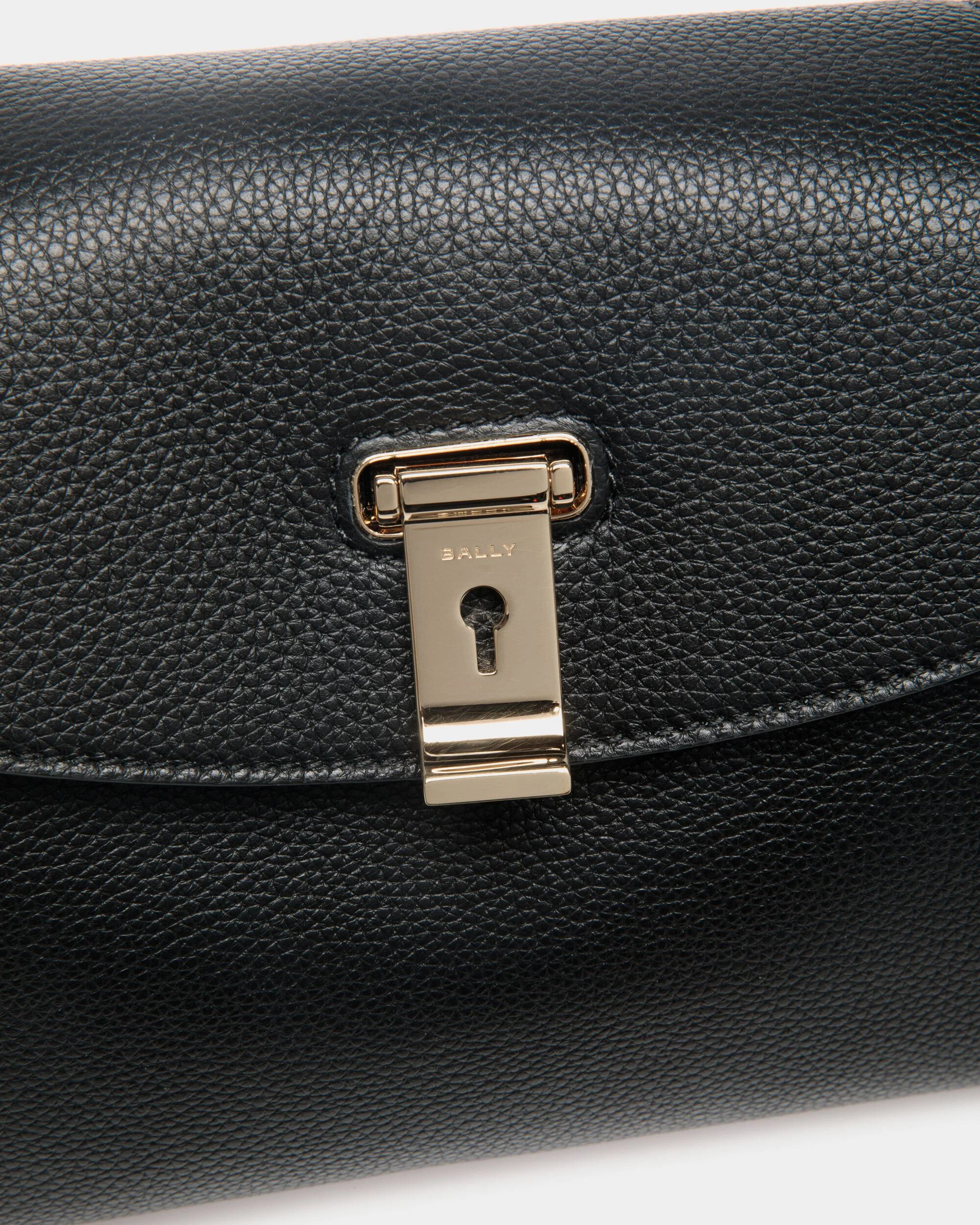 Close-up of engraved Lock Me hardware