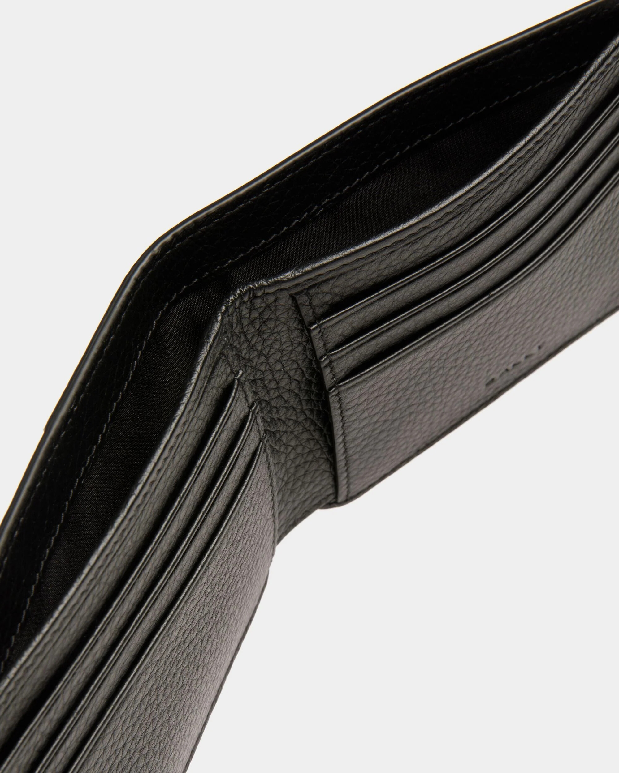 Close-up of card slots and leather grain