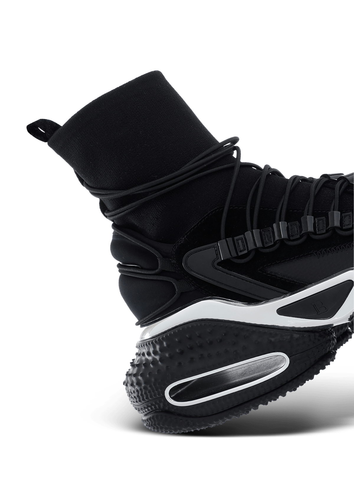 Heel detail — the sock collar and the cut-out sole architecture