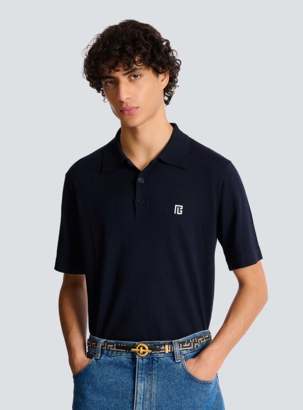 Worn at the waist with the gold buckle and a PB-logo polo