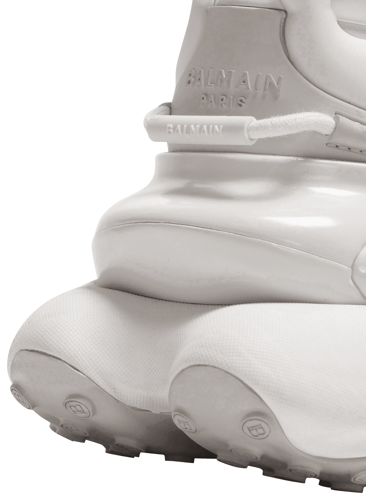 Heel macro — BALMAIN PARIS embossing over the hollow air sole
