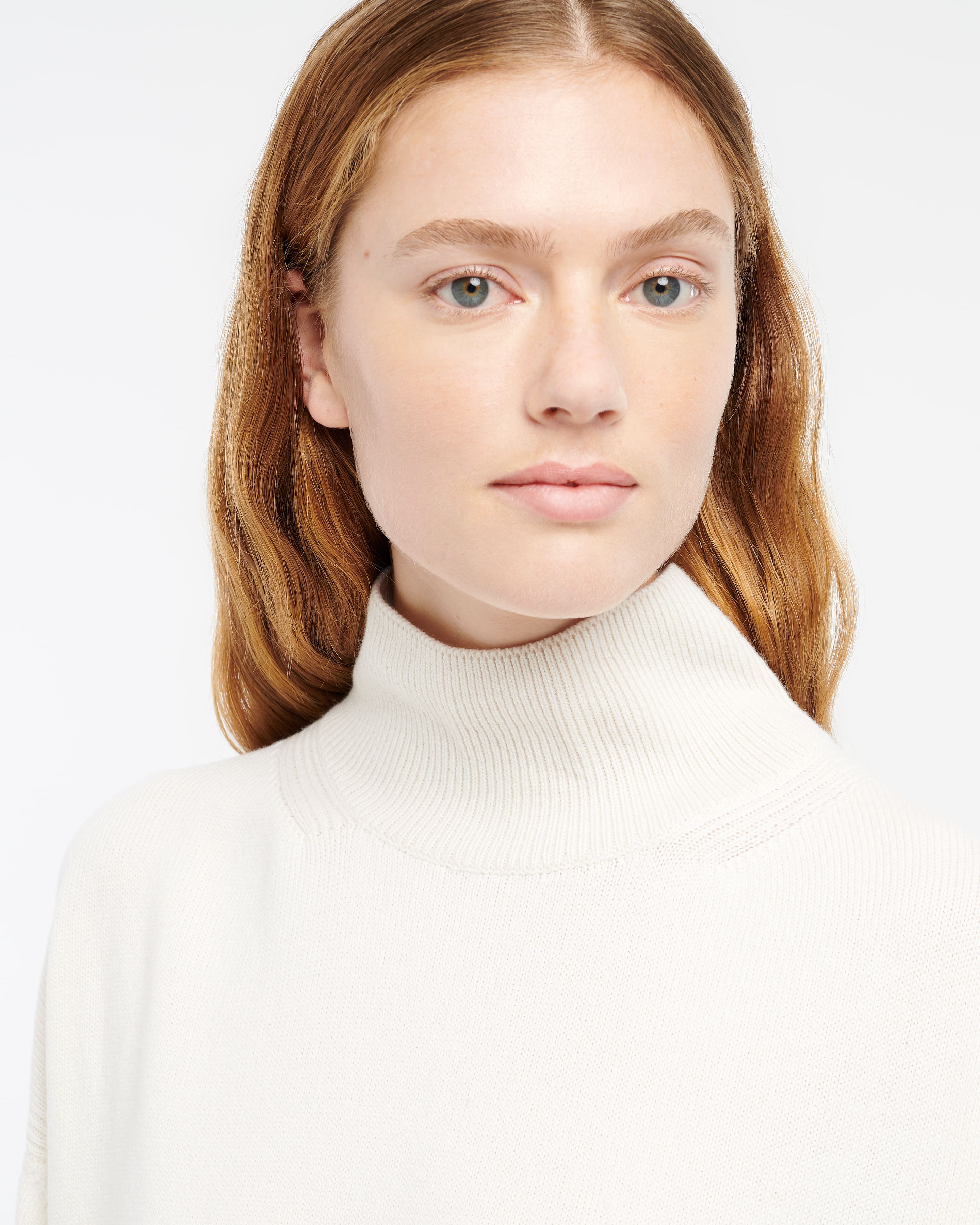 Iconic oversized roll-neck cashmere jumper — on-body front view