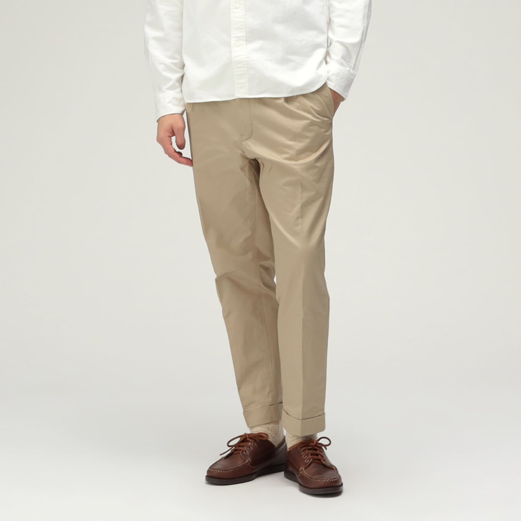 Front view of beige tapered fit