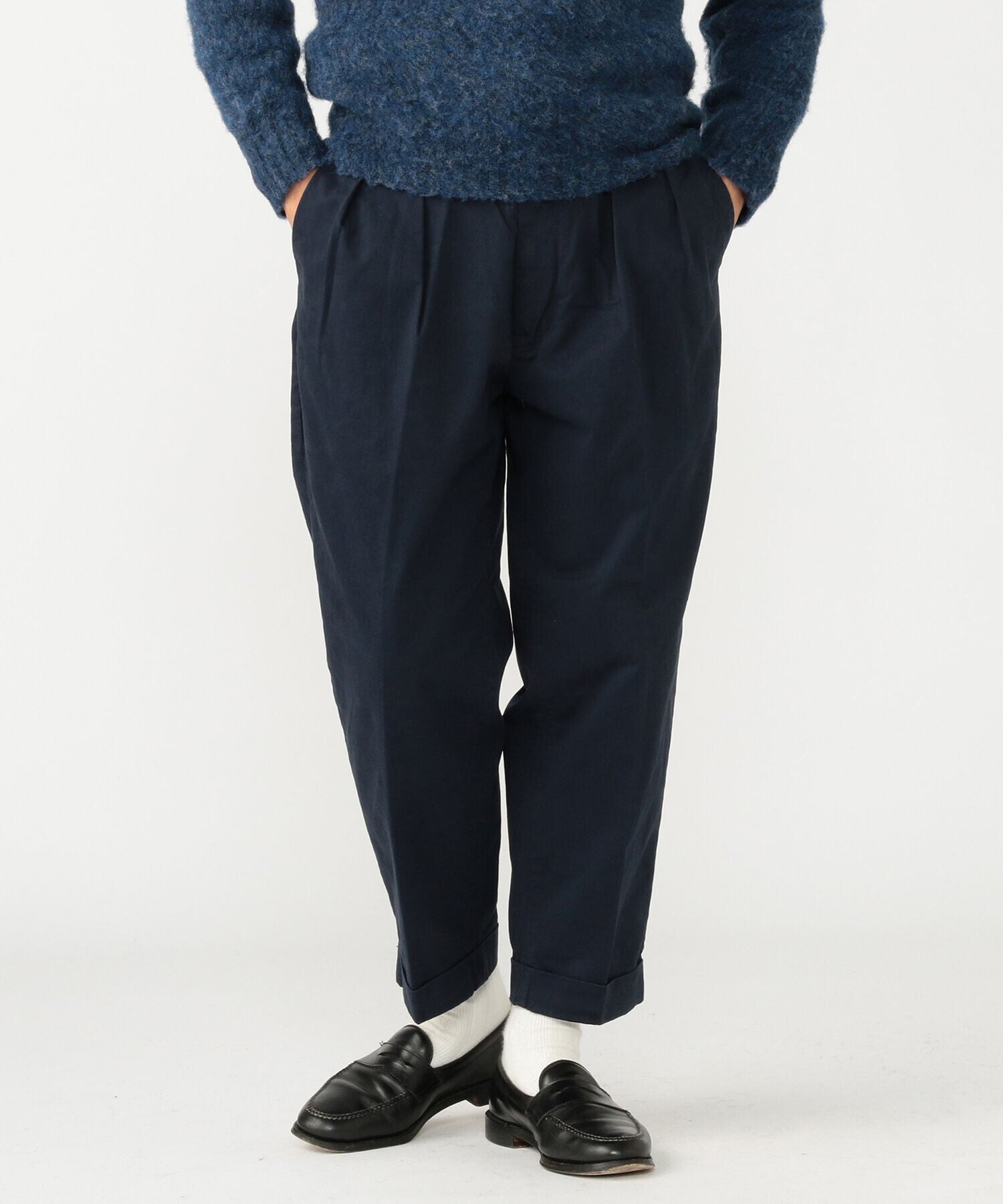 Navy wide-tapered fit worn with loafers