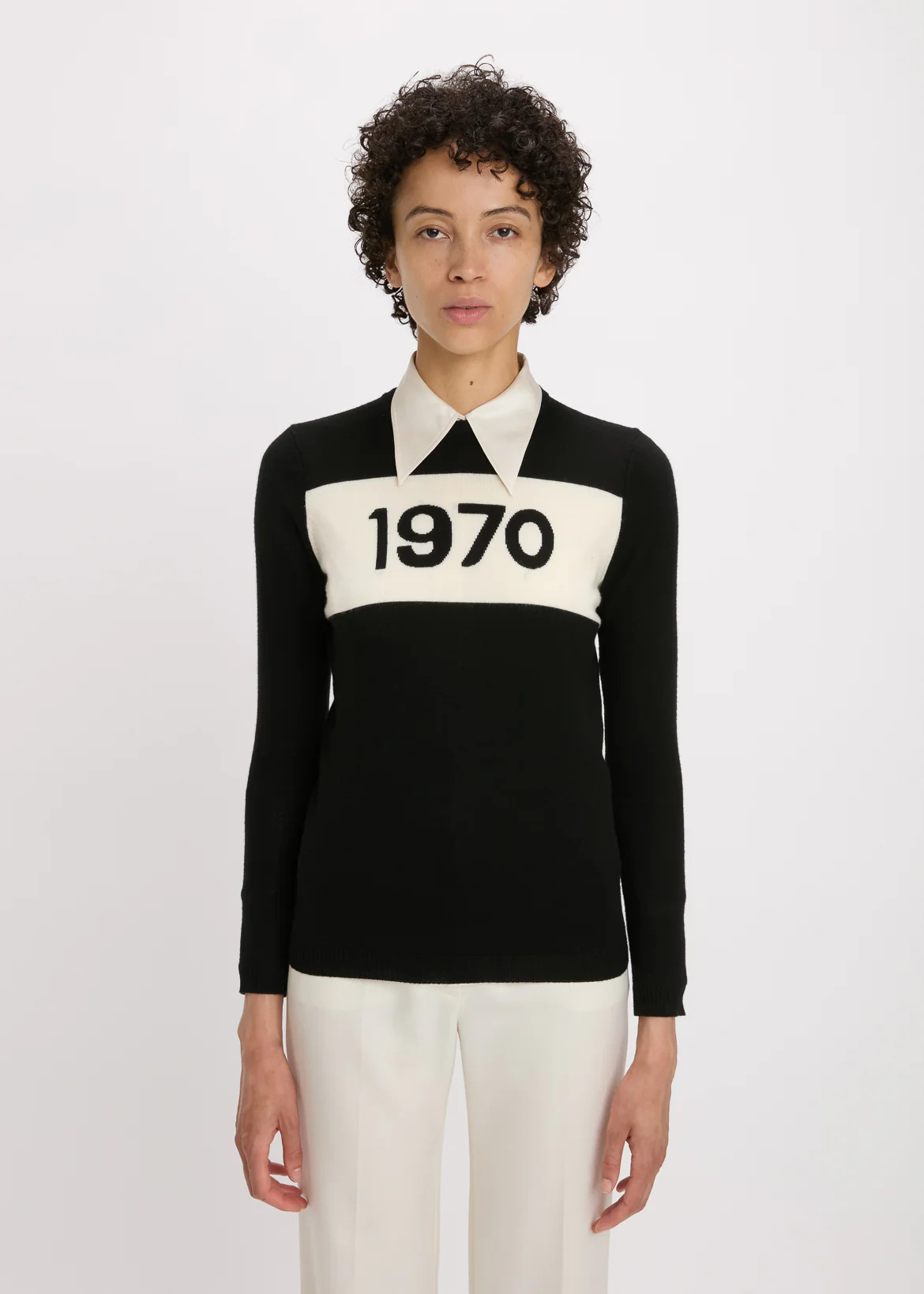 Slim-fit black 1970 jumper on model