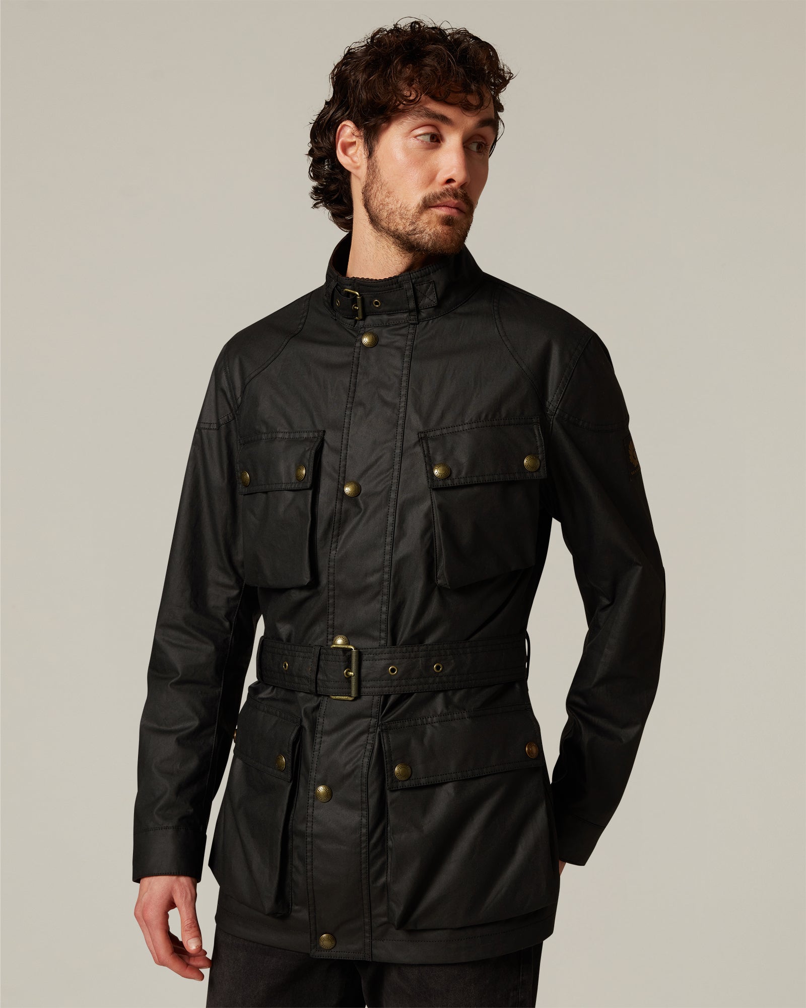 Back view of the hip-length field silhouette.