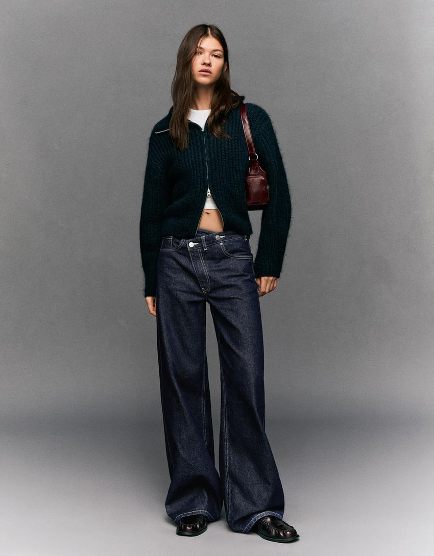 front worn view in pale denim