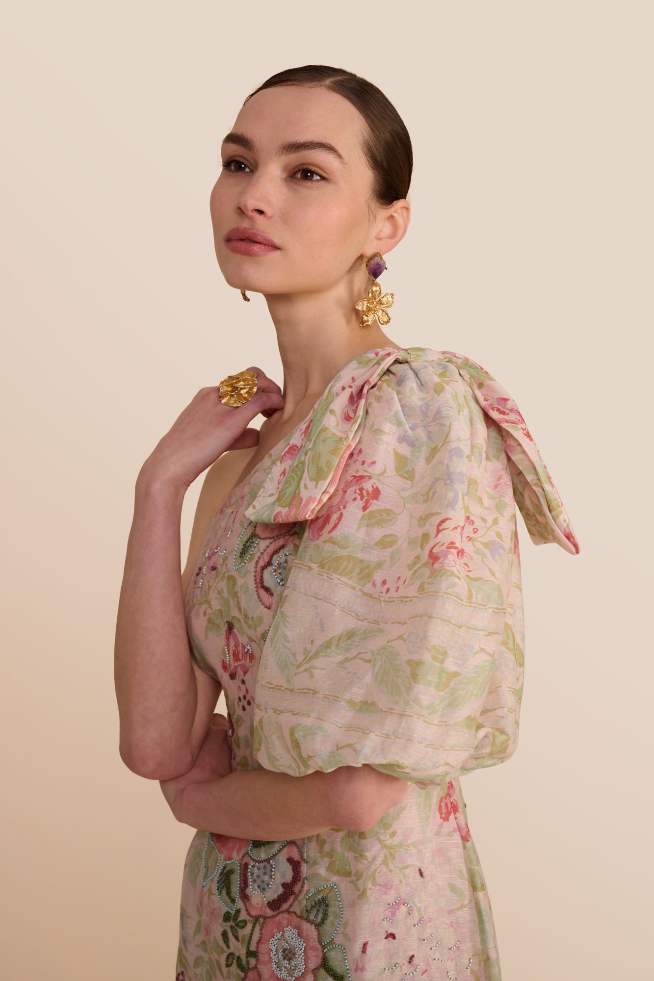 close crop of shoulder and beadwork